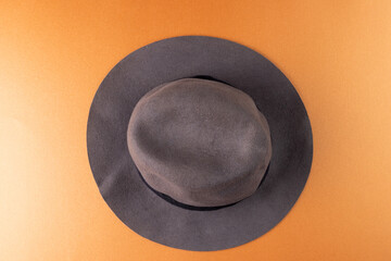 Image of wool hat lying on yellow surface