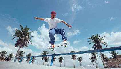 Skateboarder doing a trick in a skate park