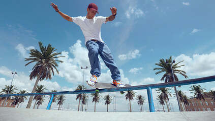 Skateboarder doing a trick in a skate park