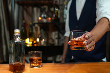 Bartender Serve Whiskey, on wood bar, 