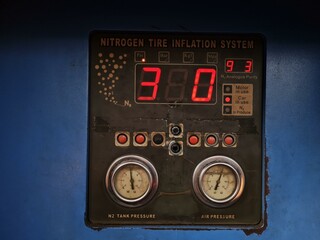 monitor screen of a nitrogen filling machine for car tires, checking car tire pressure