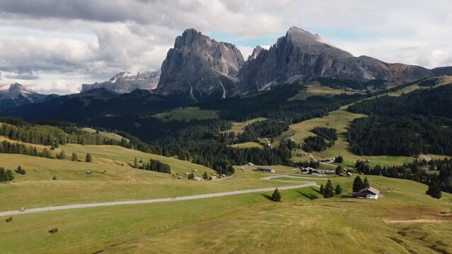 Alpe di Suisi, Dolomites, Italy Aerial drone view of Alpine meadow at idyllic Seiser Alm valley with mountains in background in South Tyrol. Europe