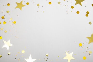 Composition of close up of new years confetti on white background