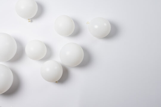 Composition of close up of new years balloons on white background