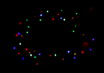Fototapeta na wymiar Multicolored round glare bokeh lights on a black background