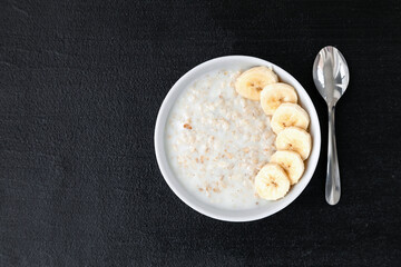Oatmeal in a bowl with banana slices