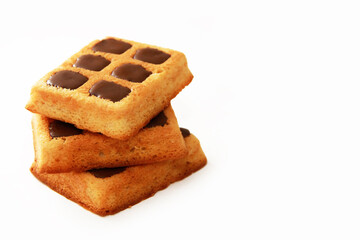 sweet baked fluted Belgian waffles with chocolate filling on a white background