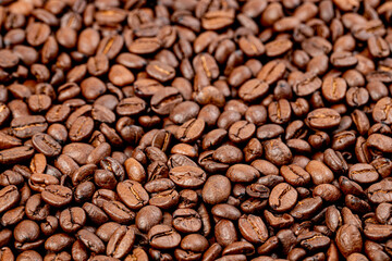 Coffee beans. Roasted coffee beans, can be used as background. Fragrant Arabica coffee.