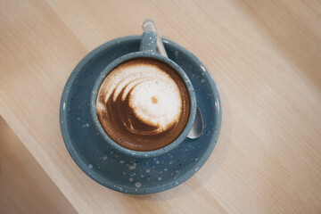chocolate milk  cup on wooden table. Top view