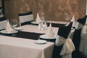 Banquet table with wineglasses. High angle of elegant banquet table served for wedding celebration