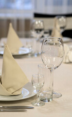 Banquet table with wineglasses. High angle of elegant banquet table served for wedding celebration