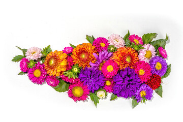 Autumn flowers flatlay background. Bouquet of colorful chrysanthemum, peonies (orange, purple, yellow, red) flowers on white background, frame border for greeting card top view copy space for text