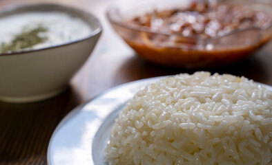 Traditional Turkish cuisine. Kuru Fasulye . Haricot Beans, rice, beans and 
tzatziki