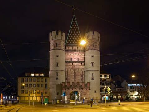 Basel, Switzerland. Spalentor gate of the former medieval city wall in night. The gate was built in 1387-1398.