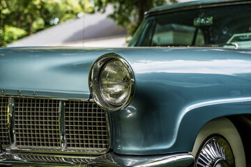 Obraz na płótnie Canvas vintage car headlight closeup