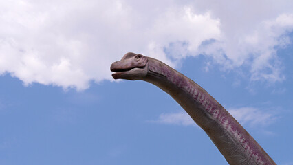 Gigantic herbivorous dinosaur - Brachiosaurus. Dino in the nature. Dinosaur head.