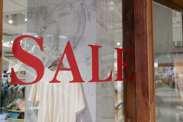 sale sign on the wall