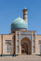 Fototapeta na wymiar Vertical landscape view of Hazrat Imam mosque with blue dome and minaret on Khast Imam square, religious center of Tashkent, Uzbekistan