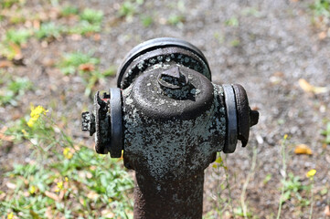 An old and very weathered water hydrant in East-Germany.