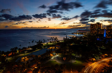 Fototapeta na wymiar Fort Derussy beach park Waikiki Oahu at sunset