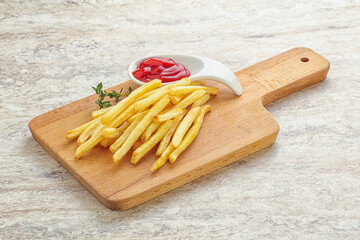 French fried potato over board