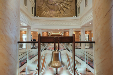 Art Deco stucco grand atrium, lobby or foyer with dramatic staircase or stairs on luxury cruiseship...