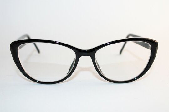 Black thick framed glasses in a retro style