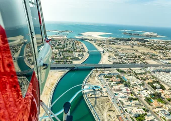 Foto op Canvas Aerial helicopter flying along the Dubai water canal © Spotmatik