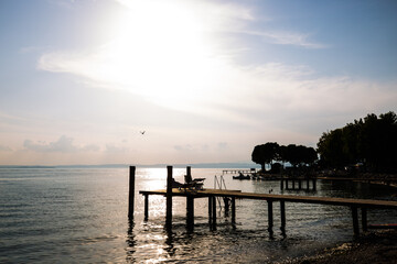 Fototapeta premium Lake Garda in Bardolino, sunset in Bardolino