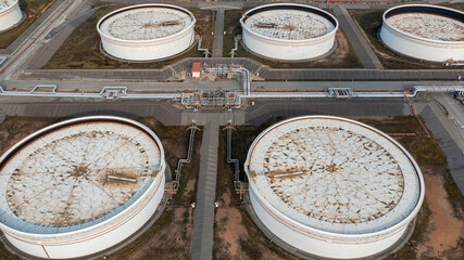 Aerial view crude oil storage tank, White storage tank farm chemical petroleum petrochemical...
