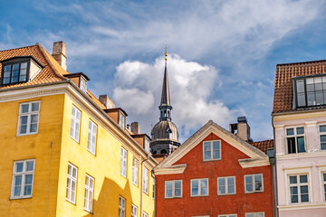 Fototapeta na wymiar Rooftops and spier in Copenhagen, Denmark