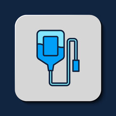 Filled outline IV bag icon isolated on blue background. Blood bag. Donate blood concept. The concept of treatment and therapy, chemotherapy. Vector