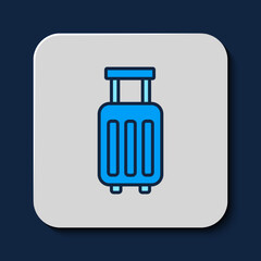 Filled outline Suitcase for travel icon isolated on blue background. Traveling baggage sign. Travel luggage icon. Vector