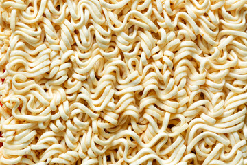 macro noodle texture,instant noodles texture,Structure of an instant noodle soup. Dry pasta used in instant dishes. Light background.