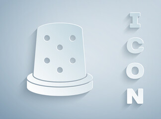 Paper cut Thimble for sewing icon isolated on grey background. Paper art style. Vector