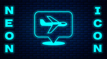 Glowing neon Plane icon isolated on brick wall background. Flying airplane icon. Airliner sign. Vector