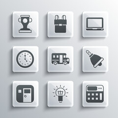 Set Light bulb, Calculator, Ringing bell, School Bus, classroom, Clock, Award cup and Laptop icon. Vector