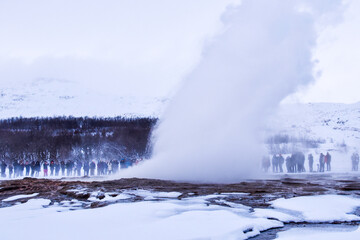 Geothermal fields Hverir. Spectacular landscape of volcanic terrain with geothermal activity in Iceland, nearby famous Hot Spring Gaysir and Strokkur, Golden Circle tourist itinerary.