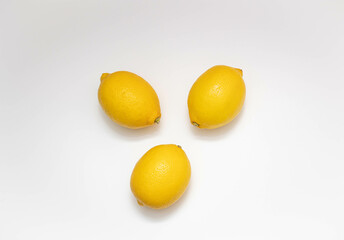 Lemons on a white background. View from above. 