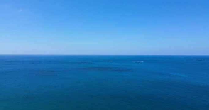 Blue ocean sea horizon as far as the eye can see One part sky, one part sea. Aerial view shot by drone camera 