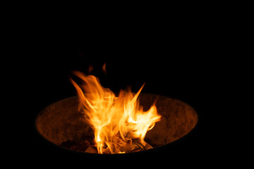 Close-Up Of Fire Against Black Background