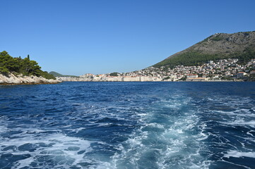 The outer walls of the old walled town of Dubrovnik at Dalmatia in Croatia from the sea. 