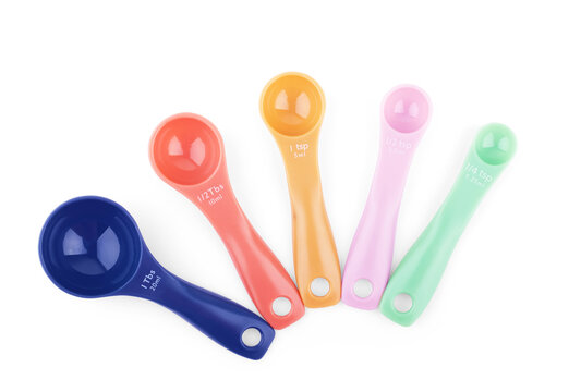 Measuring spoons plastic on white background