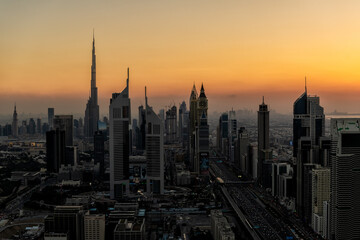 Aerial Dubai sunset cityscape of modern Skyscrapers UAE