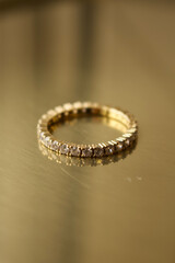 wedding women's rings on a gold background