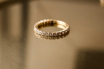 wedding women's rings on a gold background