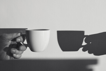 Imagination With Coffee cup and Shadows. Mental Disorders