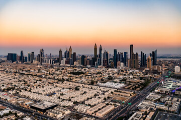 Aerial sunset view of Dubai city residential suburbs