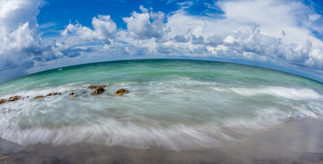 Fisheye long exposure of the Gulf of Mexico at Caspersen Beach in Venice FLorida USA
