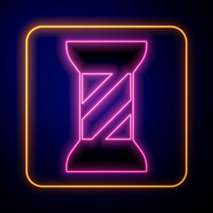 Glowing neon Sewing thread on spool icon isolated on black background. Yarn spool. Thread bobbin. Vector